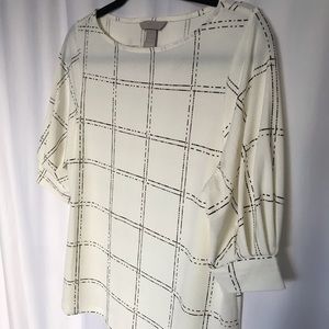 Soft geo print formal top